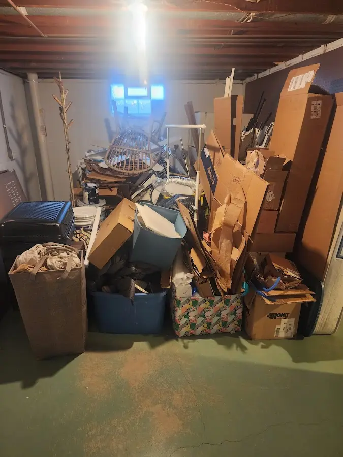 Roll-off dumpster container at job site for 8 Yard Dumpster Rental in Larchmont